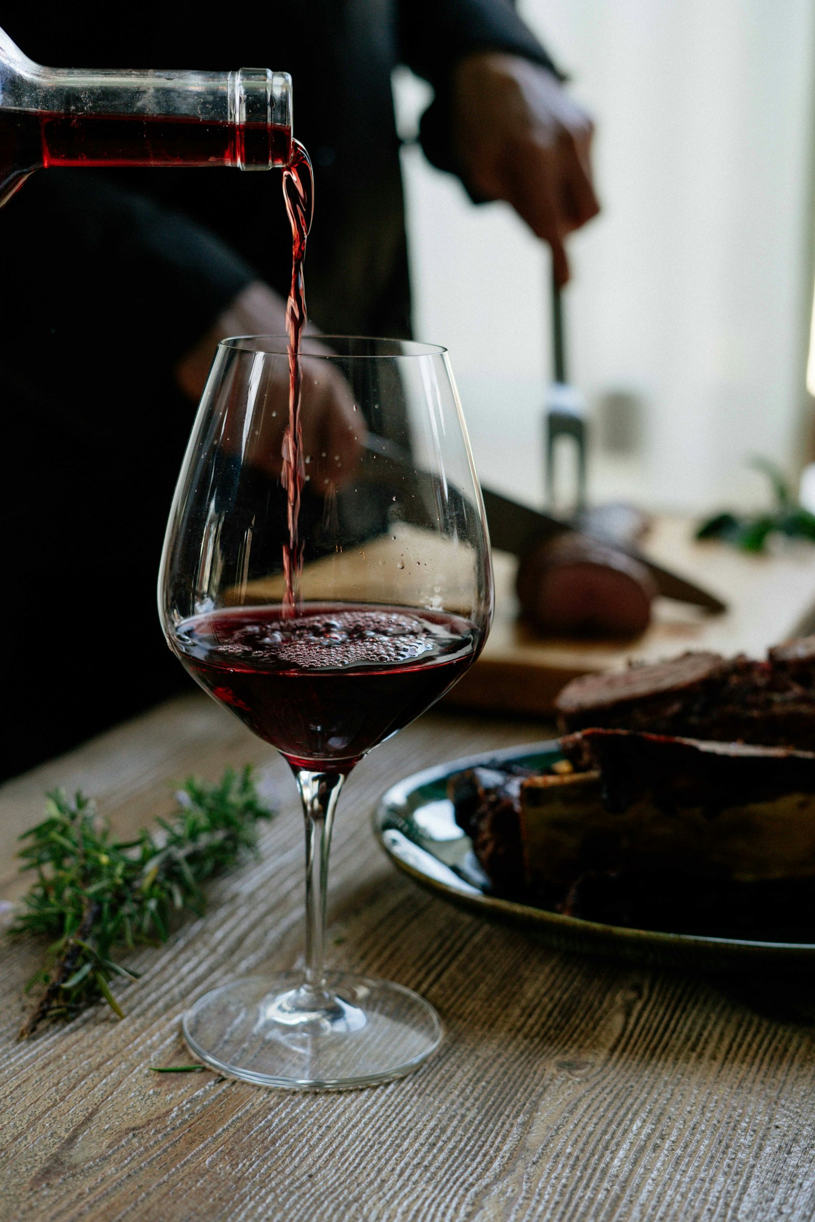 Trezee red wine being poured into a glass